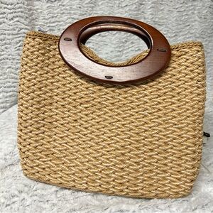 Woven straw bag with wooden handles